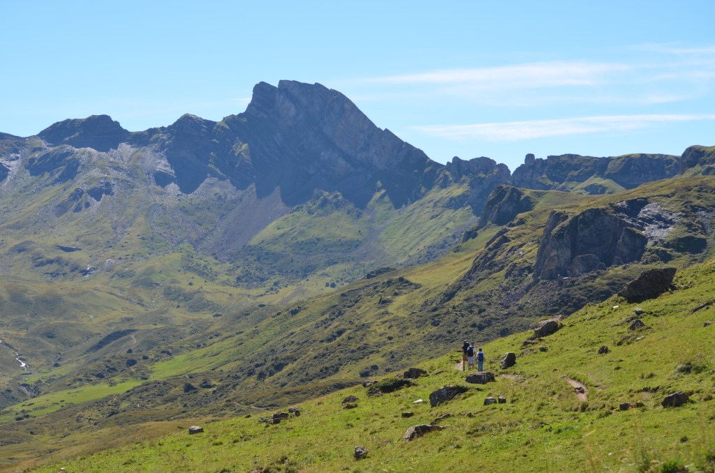 Swiss Alps, hiking in a green mountain landscape. Photo by Helena J. /Abroadland
